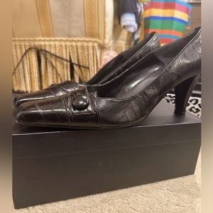 Low heel black button heels